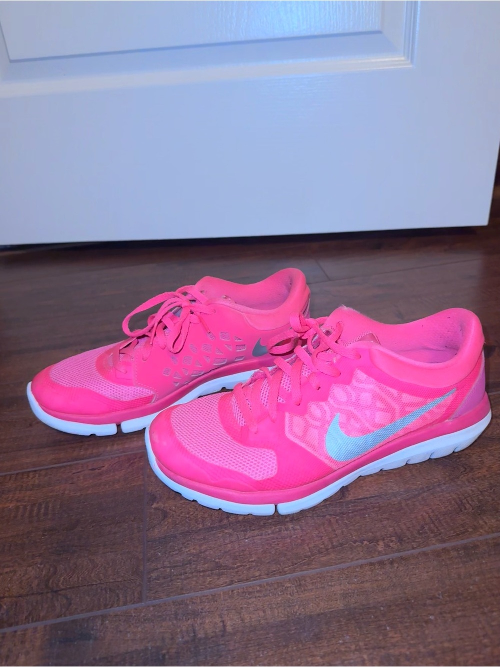 Nike Women's Neon Pink Mesh Training Sneakers with Silver Swoosh